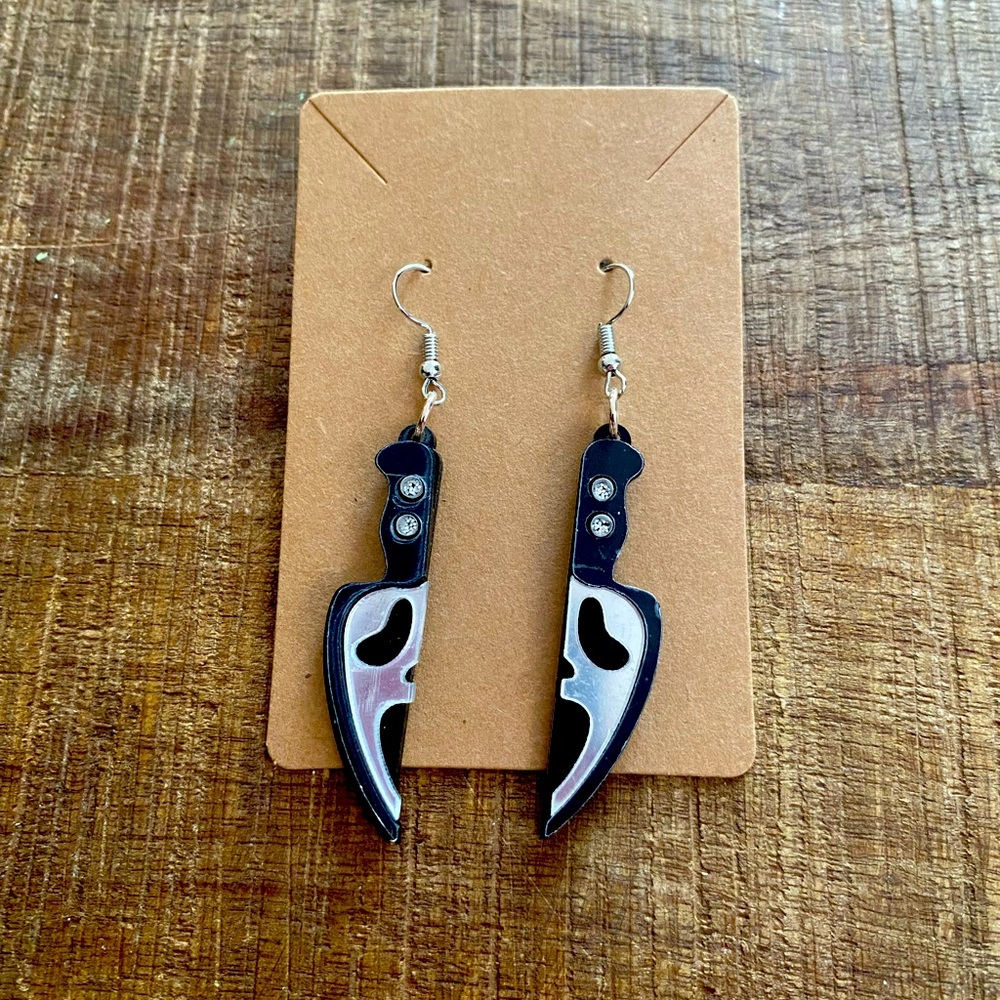 Ghost Face earrings.